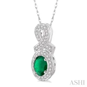 6x4 MM Oval Cut Emerald and 1/5 Ctw Round Cut Diamond Pendant in 10K White Gold with Chain