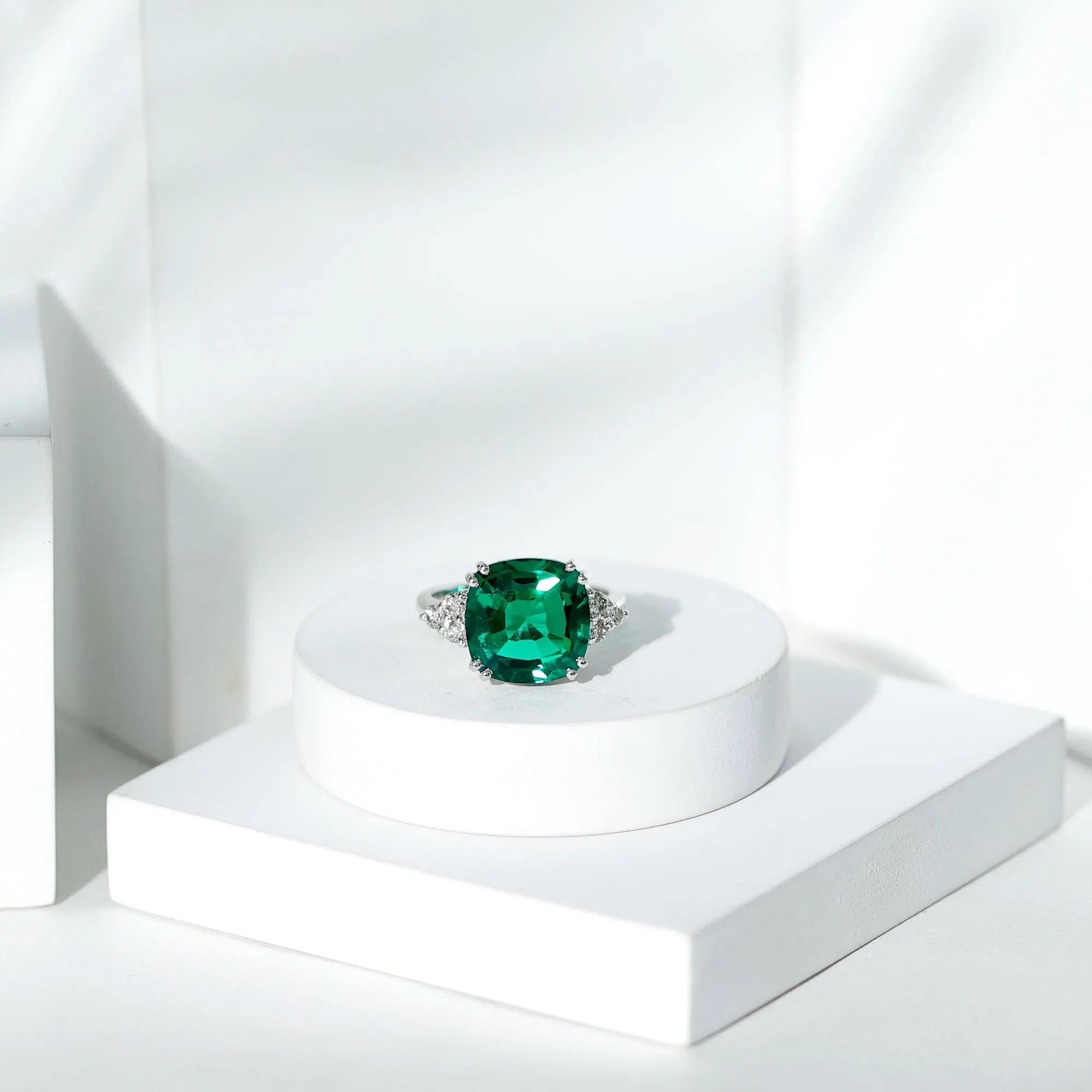 Cushion Cut Created Emerald Engagement Ring with Diamond Trio