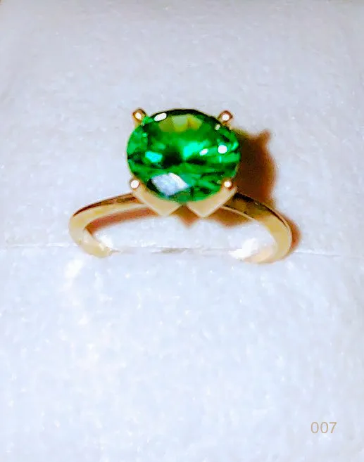 Ladies 14 karat Gold Synthetic Emerald Ring sz.6