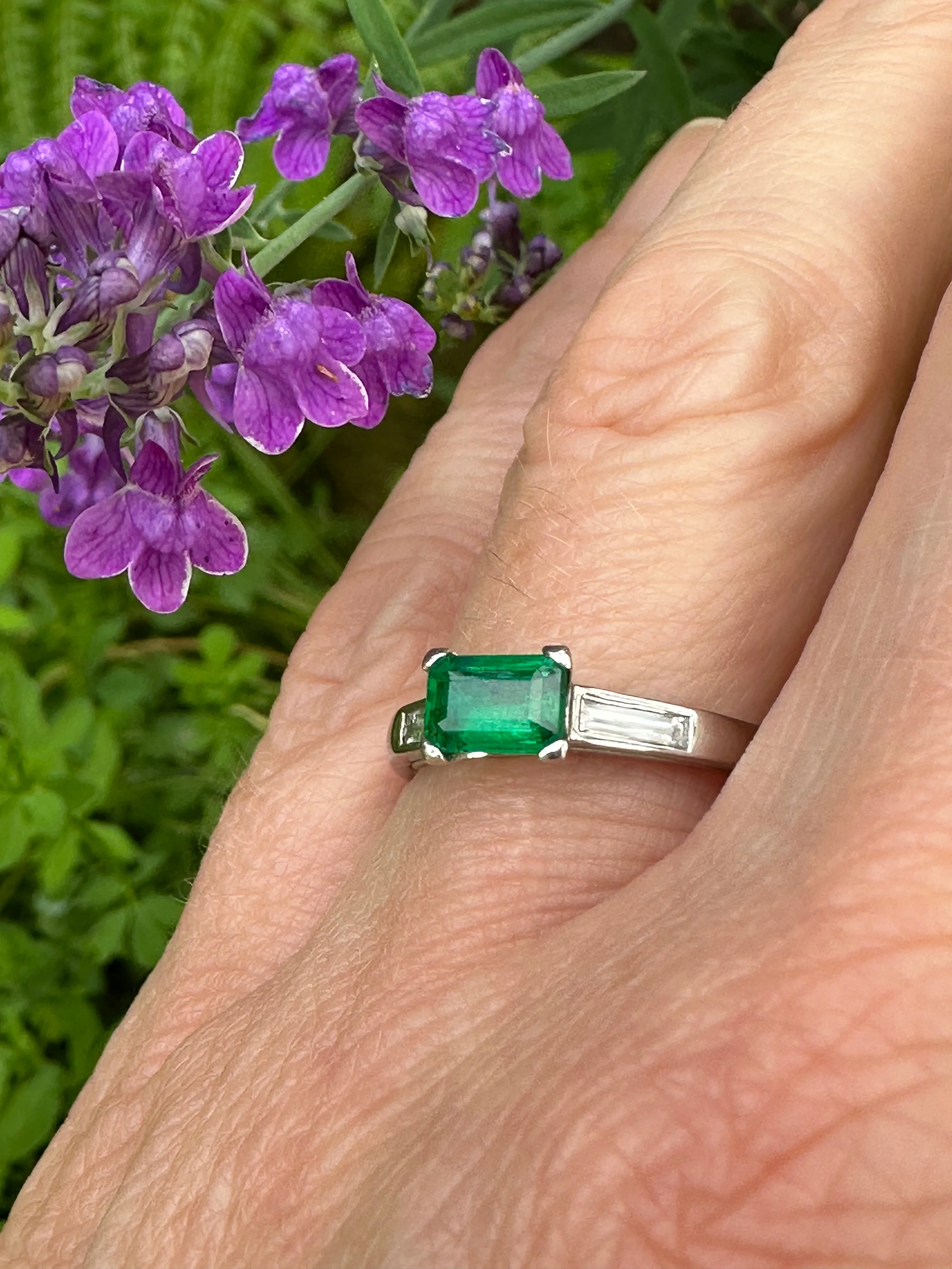 Platinum & emerald ring with baguette diamonds