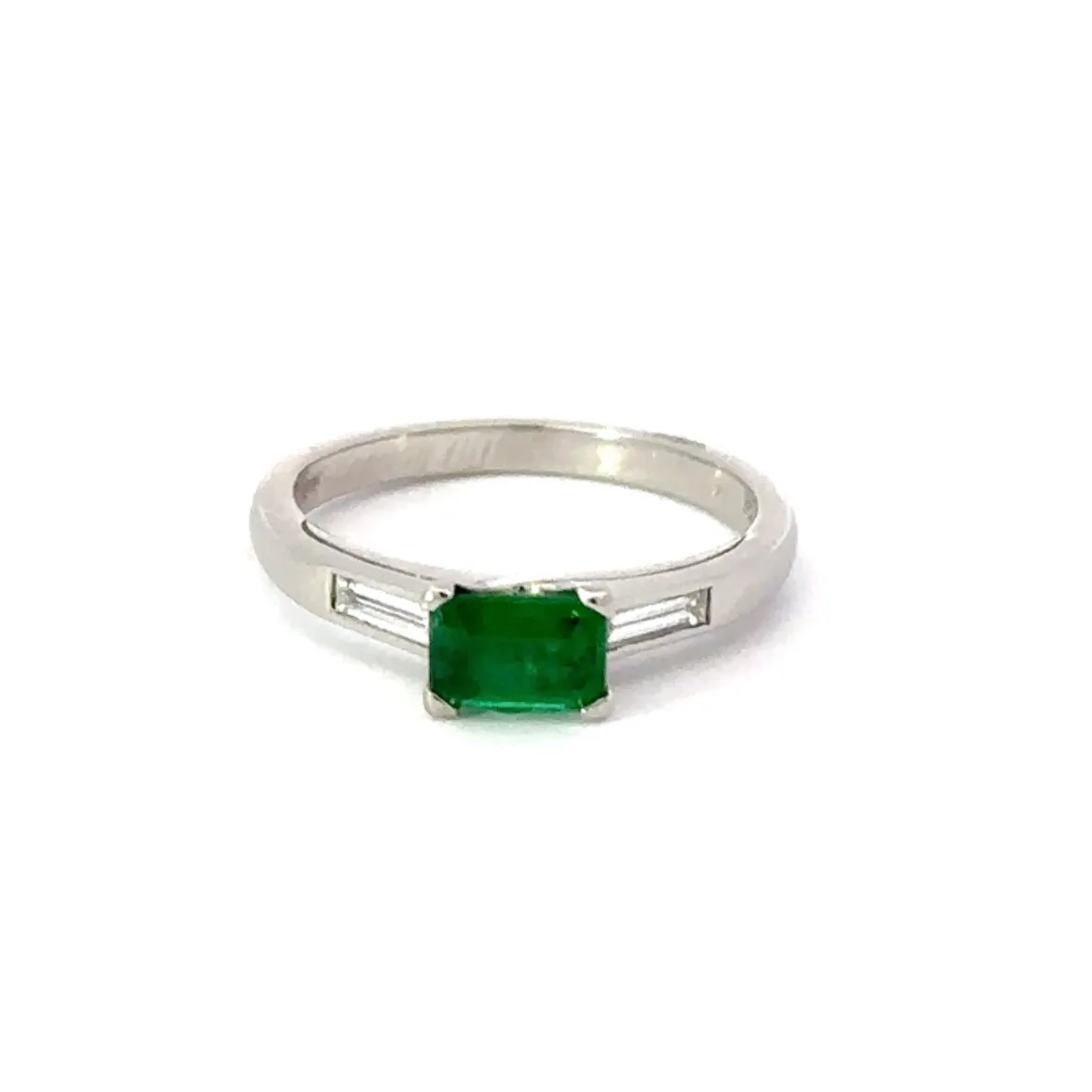 Platinum & emerald ring with baguette diamonds