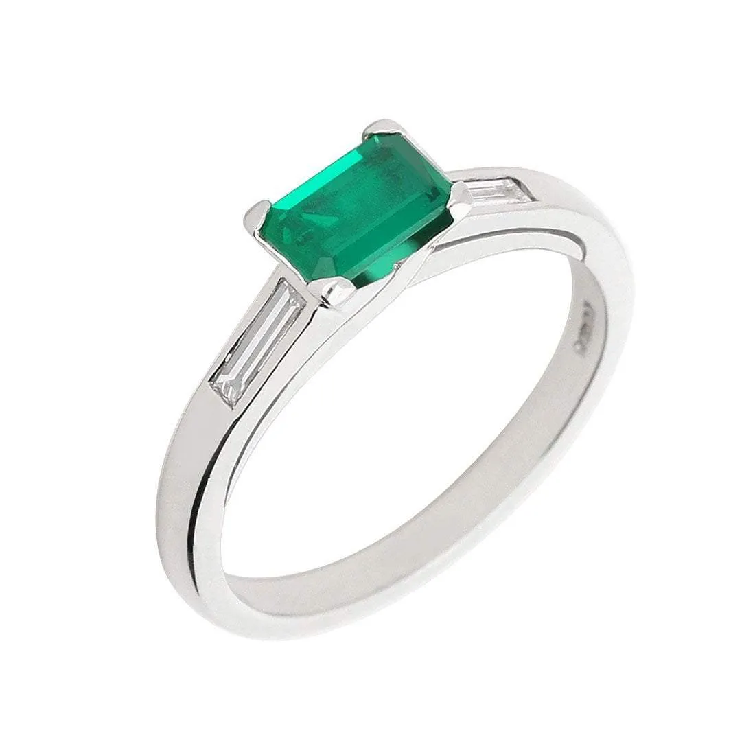 Platinum & emerald ring with baguette diamonds